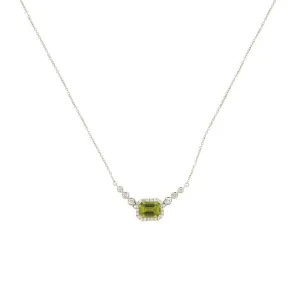 14 Karat White Gold Halo Necklace With A Peridot & Diamonds