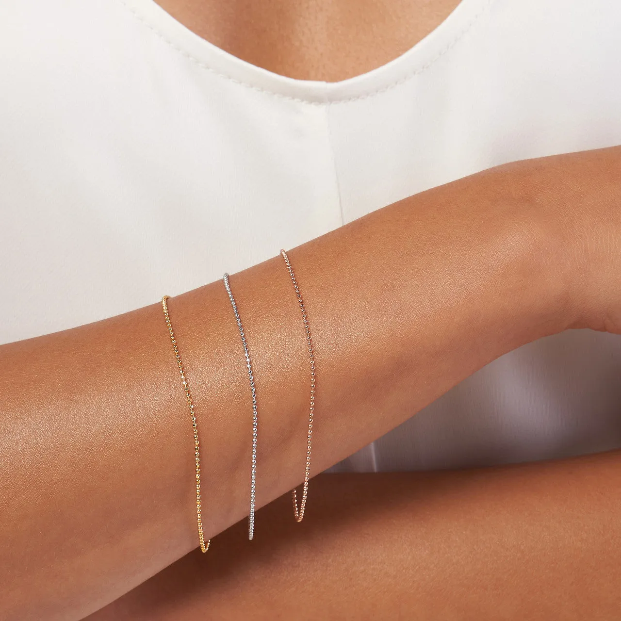 14K Gold Mini Diamond Cut Bead Bracelet