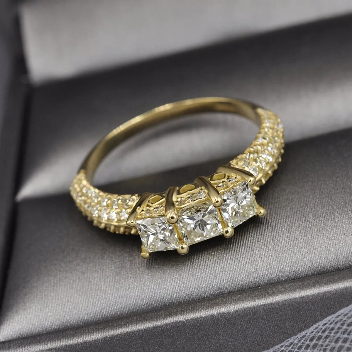 2.25 CT Round & Princess Cut Diamonds - Three Stone Ring
