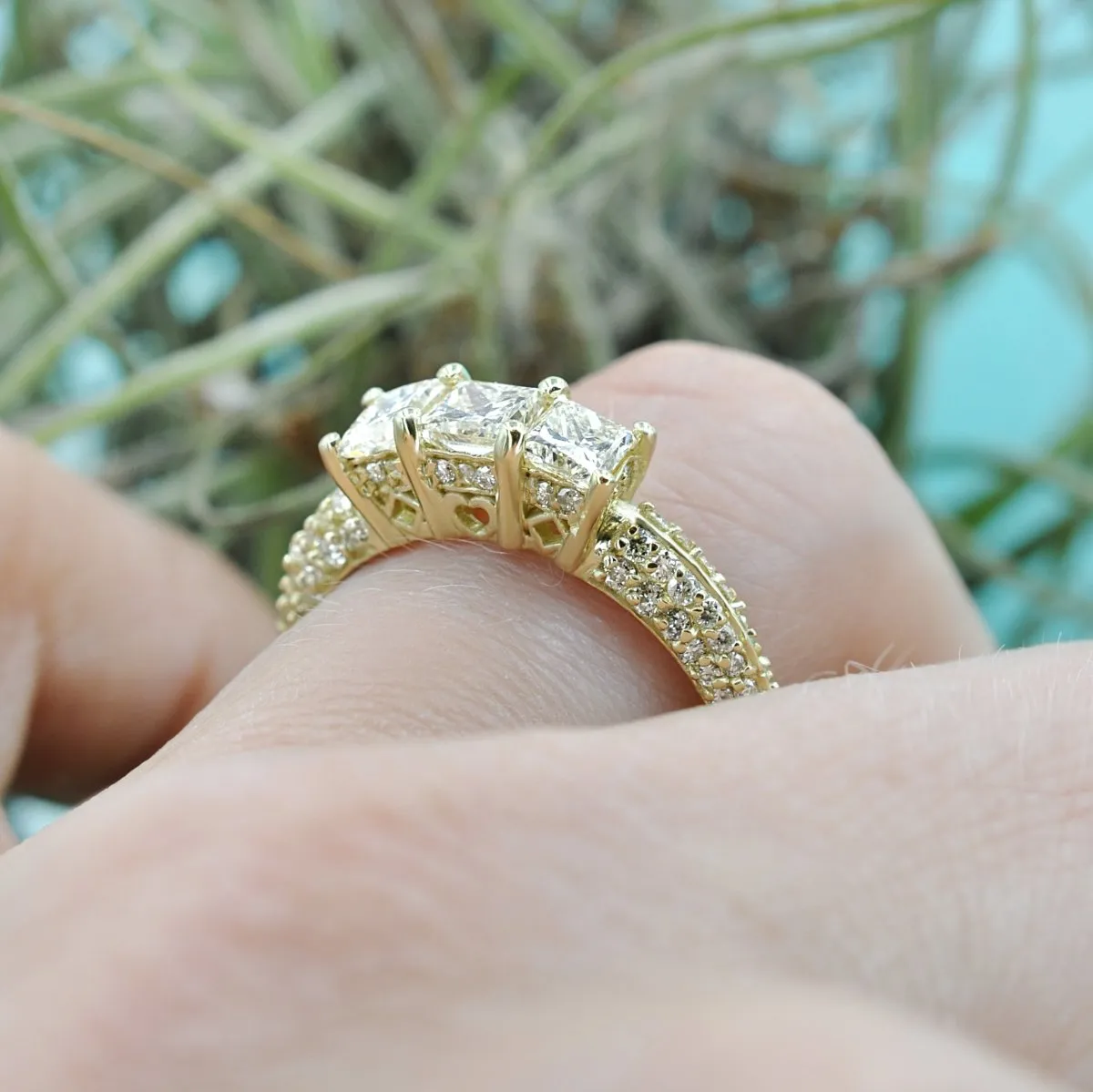 2.25 CT Round & Princess Cut Diamonds - Three Stone Ring