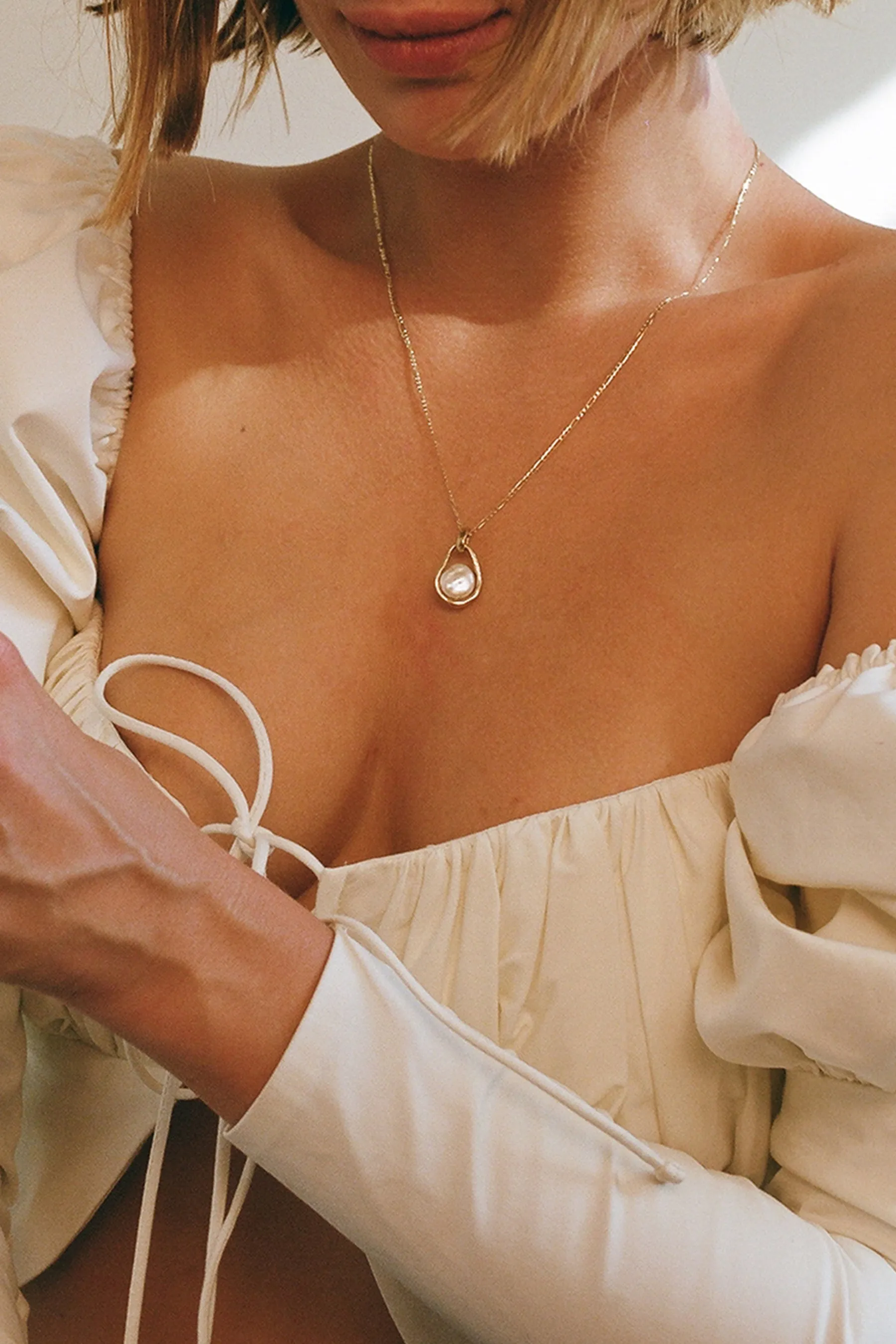 caged pearl necklace