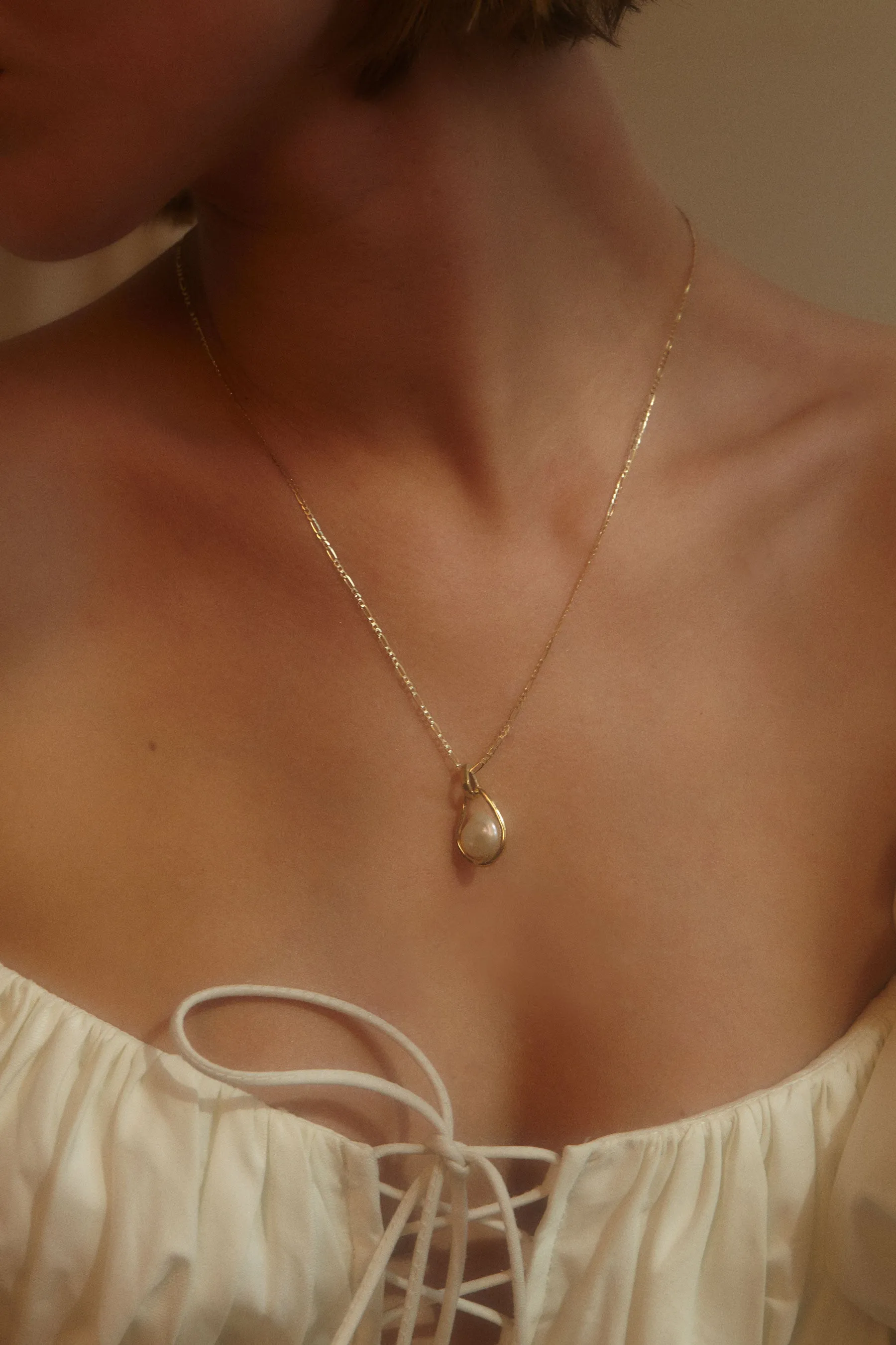 caged pearl necklace