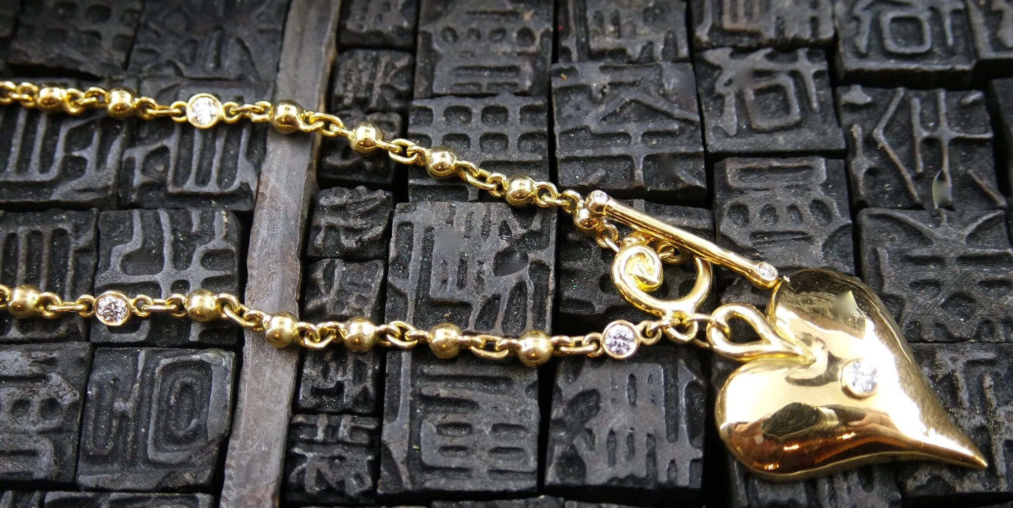 Erica Courtney 18K Gold and Diamond Bracelet with Heart Charm