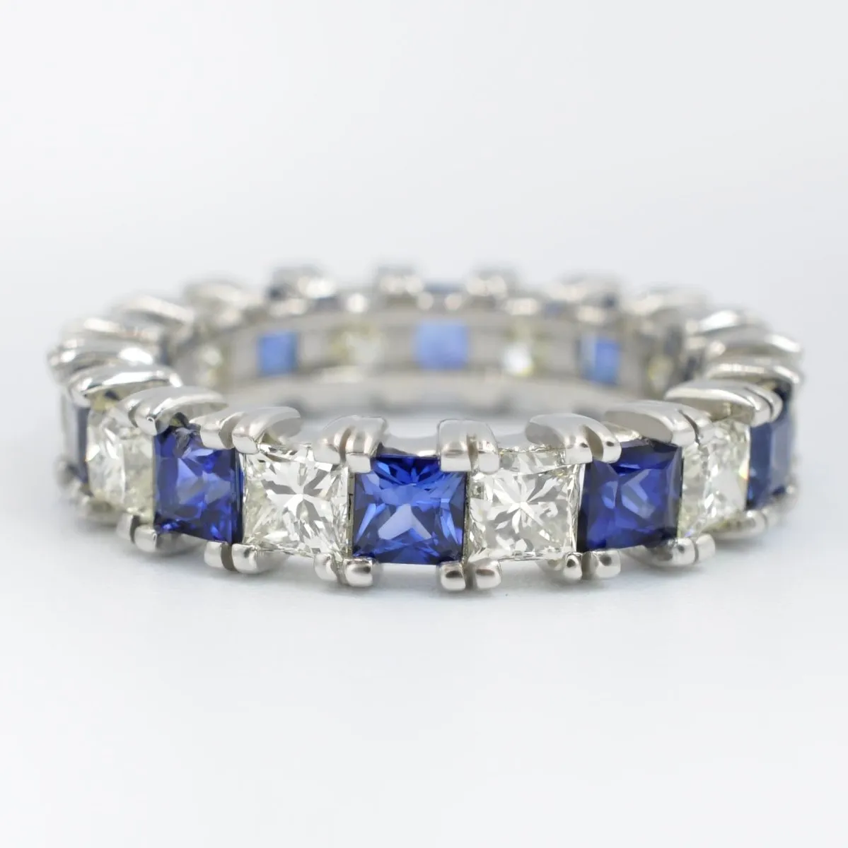 Exquisite 4.70CT Princess cut Diamonds and Blue Sapphires Eternity Ring in 18KT White Gold