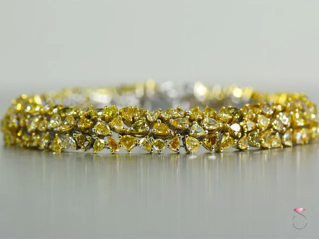 Gorgeous 14.25 ct. Fancy Yellow Diamond Tennis Bracelet in 18K