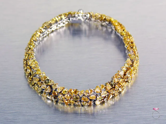 Gorgeous 14.25 ct. Fancy Yellow Diamond Tennis Bracelet in 18K