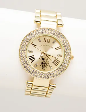 LADIES GOLDTONE WATCH WITH CRYSTAL ENCRUSTED BEZEL