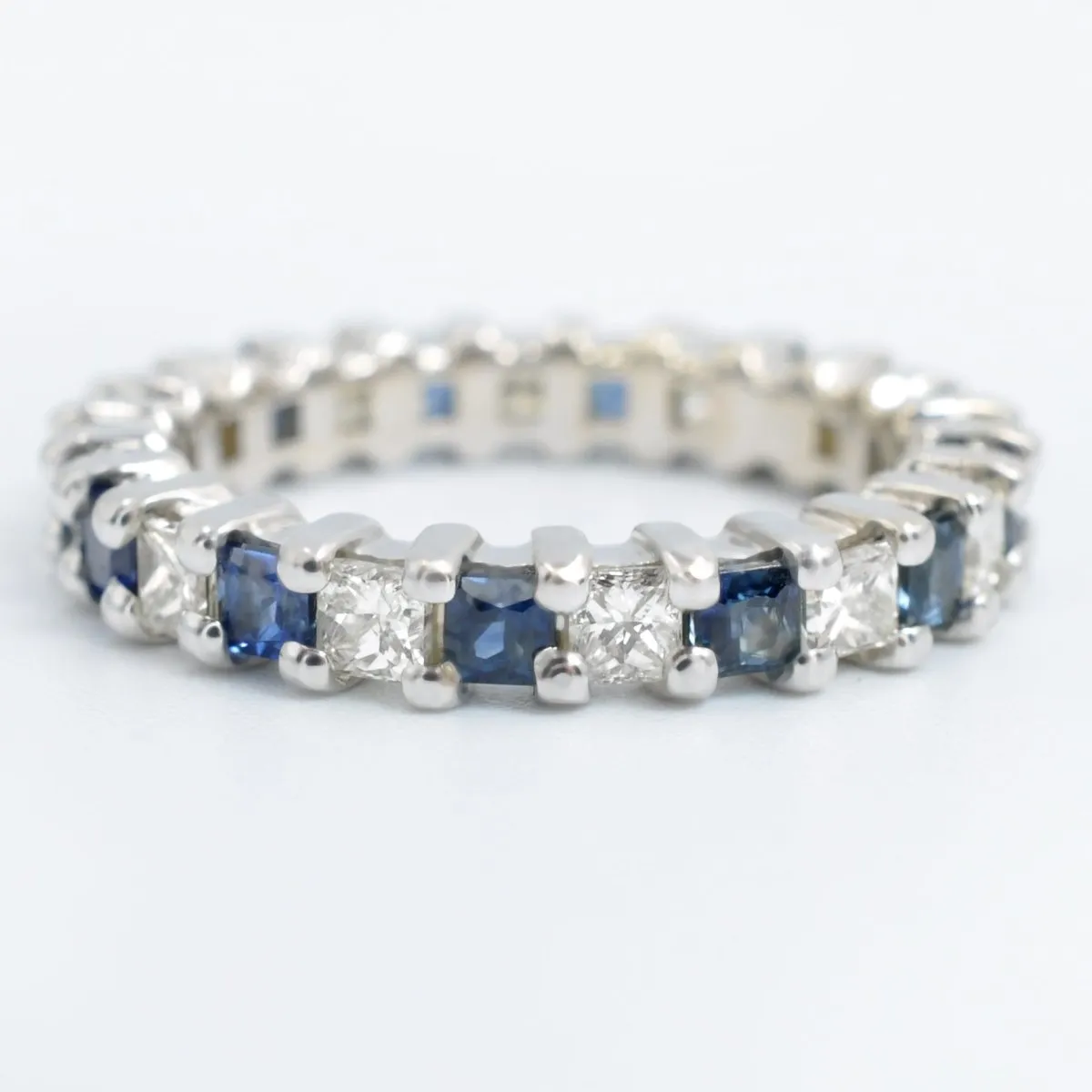 Reduced 3.40 CT Princess Cut Blue Sapphire and Diamond Eternity Ring in 14 KT White Gold
