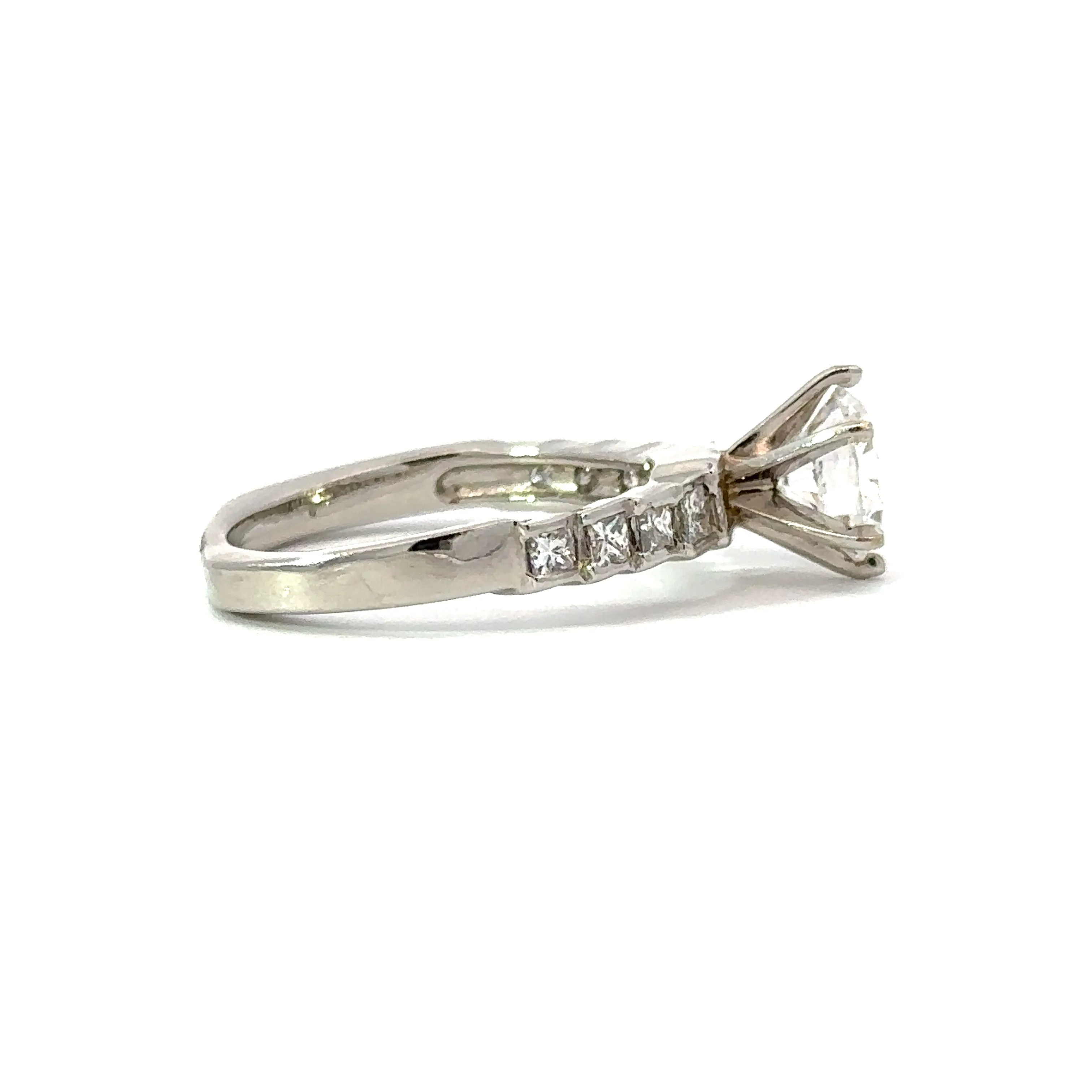 Side Stone Step Channel Engagement Ring in Platinum