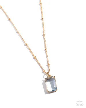 Suave Simplicity - Blue - Transparent Emerald Cut Gem Gold Paparazzi Short Necklace